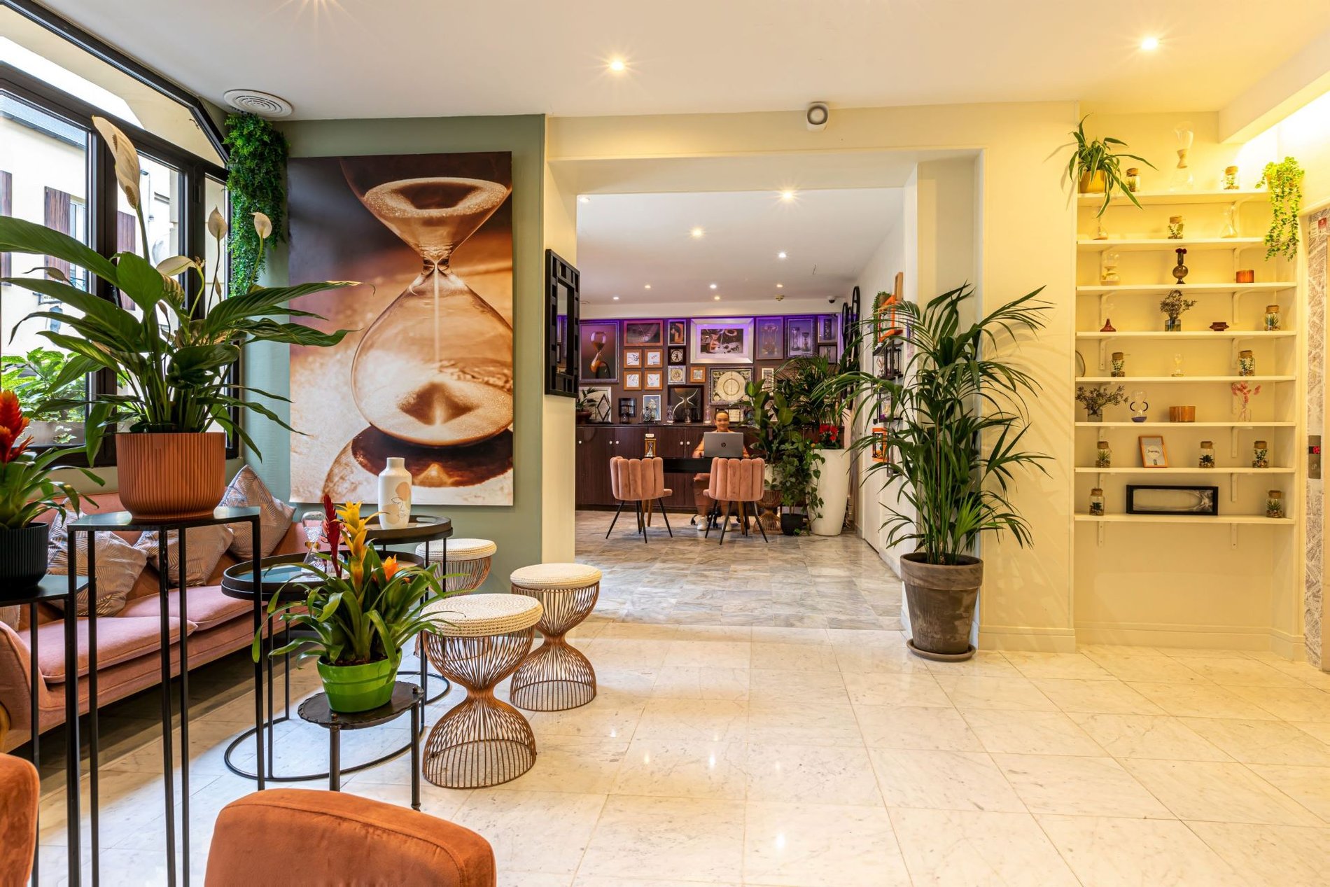 Welcoming interior of Hotel Ariane Montparnasse in Paris, with elegant and modern decor.
