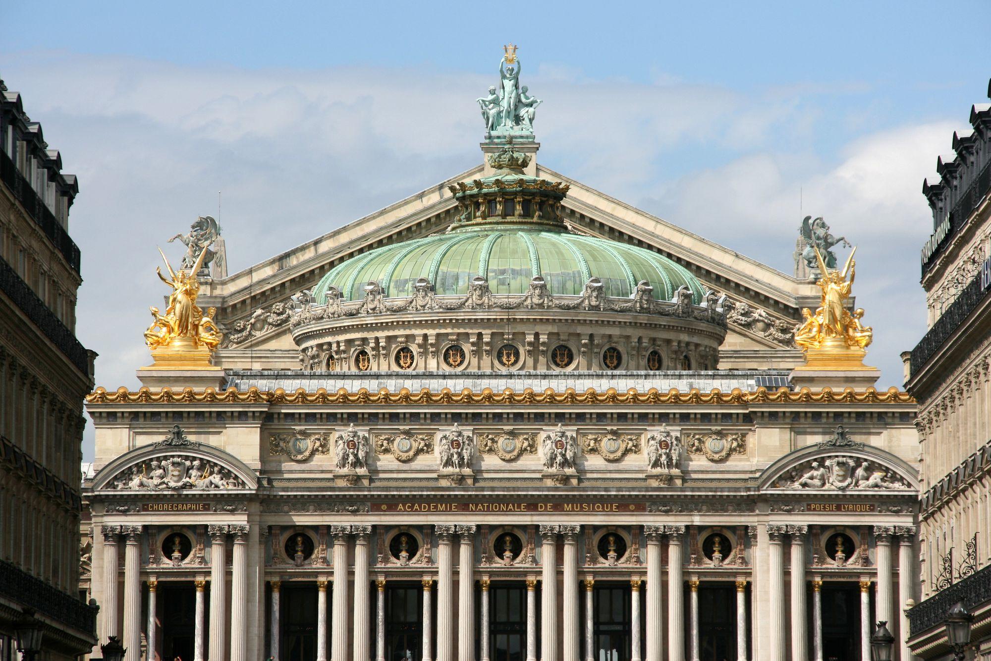 Close to Hotel Gramont Paris, the Opera Garnier, inaugurated in 1875, stands as an emblem of the district.